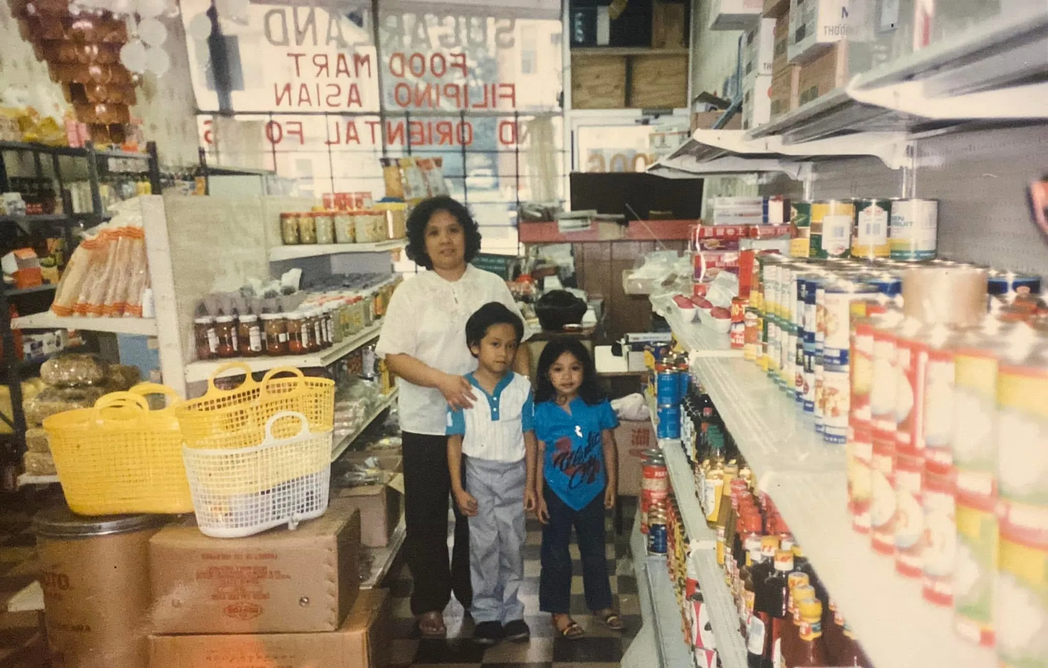 Ruth Rama with Mat and Kim inside the original Sugarland Food Mart on Detroit Avenue
